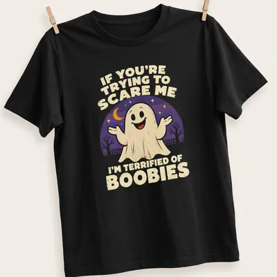 Retro tee with a funny ghost and humorous text about being scared of boobies.