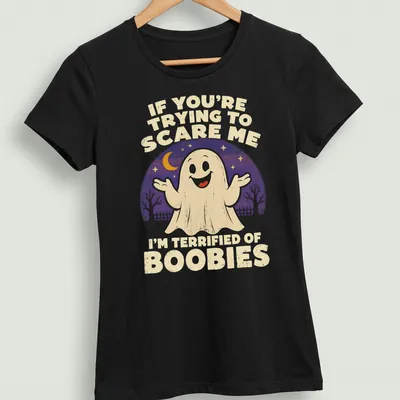 Retro tee with a funny ghost and humorous text about being scared of boobies. — printed on a women's shirt