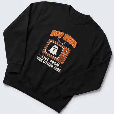 Playful cartoon ghost design with text 'Boo News Live From The Other Side' in orange and white — printed on a unisex sweatshirt