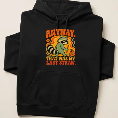 Retro cartoon raccoon holding a stick with humorous text on a — printed on a unisex hoodie