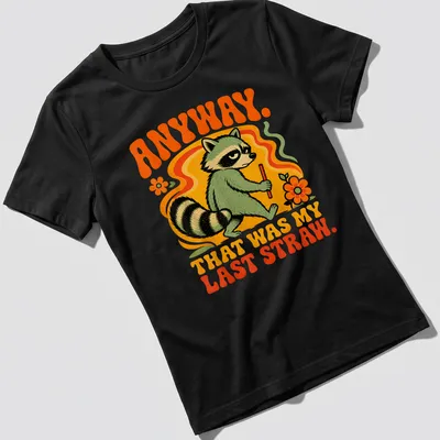 Retro cartoon raccoon holding a stick with humorous text on a — printed on a women's shirt