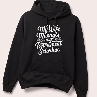 Funny script typography shirt with text about retirement schedule management by wife — printed on a unisex hoodie