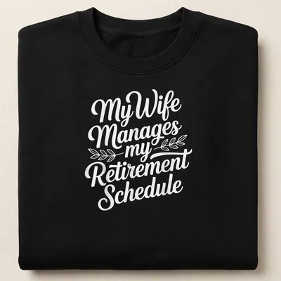 Funny script typography shirt with text about retirement schedule management by wife — printed on a unisex sweatshirt