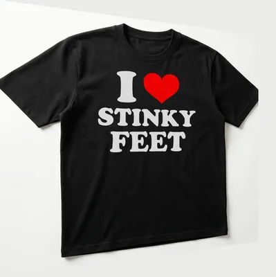 Bold playful t-shirt with red and white text saying I love STINKY FEET — printed on a unisex t-shirt (angled view)