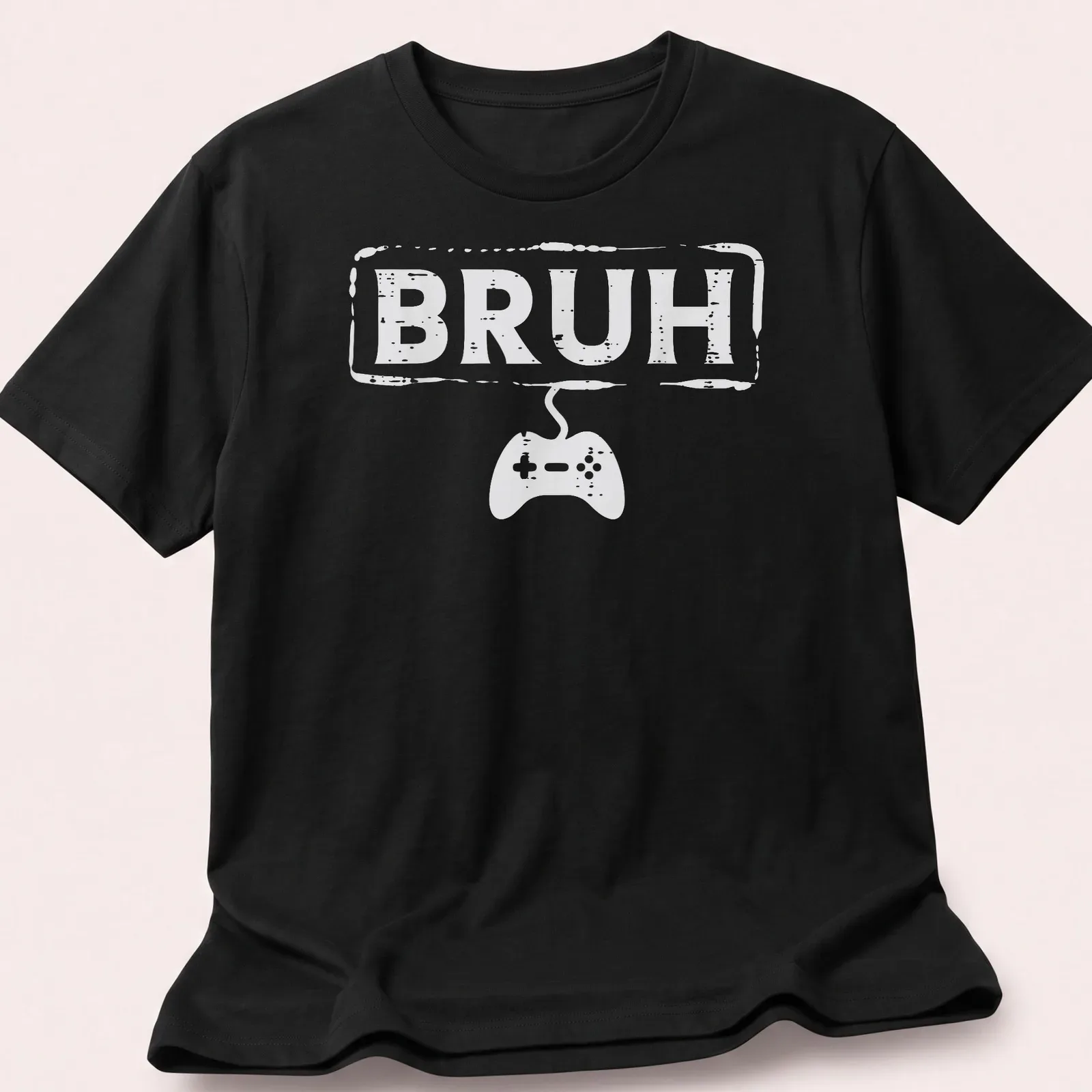 Bold typography Gamer Bruh shirt featuring a video game controller in white — printed on a unisex t-shirt