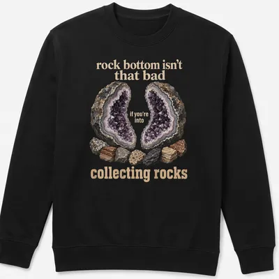 Illustrative design featuring various rocks and a geode with a humorous quote about collecting rocks. — printed on a unisex sweatshirt