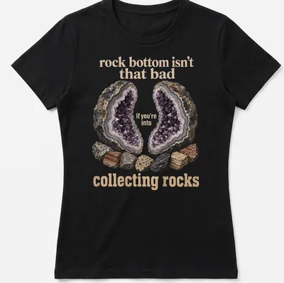 Illustrative design featuring various rocks and a geode with a humorous quote about collecting rocks. — printed on a women's shirt