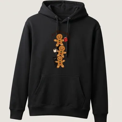 Kawaii style T-shirt with gingerbread cookies and a black cat illustration alongside festive text — printed on a unisex hoodie