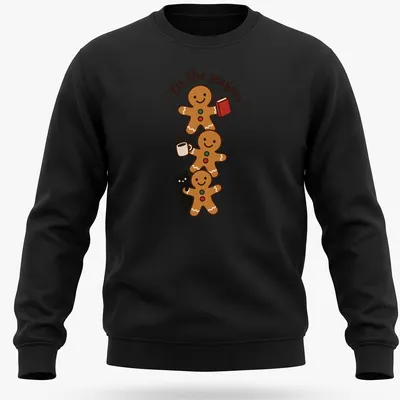 Kawaii style T-shirt with gingerbread cookies and a black cat illustration alongside festive text — printed on a unisex sweatshirt