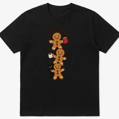 Kawaii style T-shirt with gingerbread cookies and a black cat illustration alongside festive text