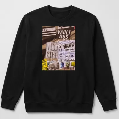 Graffiti-inspired t-shirt with bold text and urban collage design in black, white, yellow, and gray — printed on a unisex sweatshirt