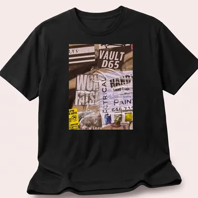 Graffiti-inspired t-shirt with bold text and urban collage design in black, white, yellow, and gray
