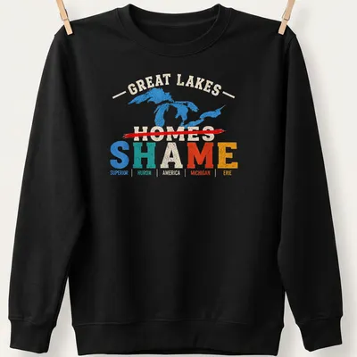 Vintage distressed Great Lakes map design featuring prominent text about Michigan — printed on a unisex sweatshirt