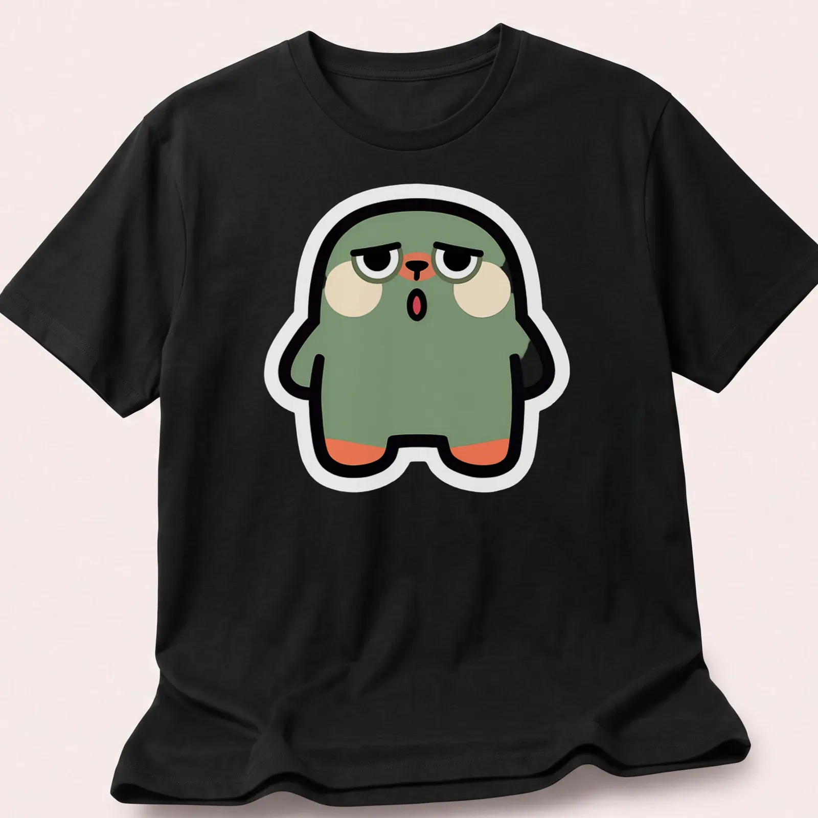 Flat design of a cute green blob monster with peach and black accents — printed on a unisex t-shirt