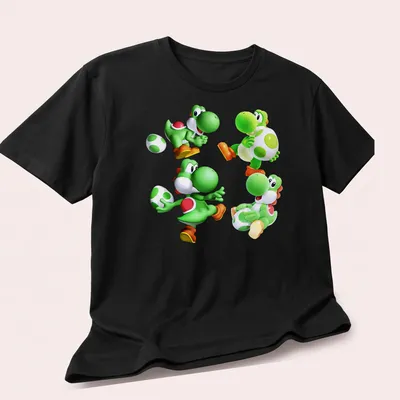 Cartoon print featuring Green Yoshi characters and playful text in vibrant colors. — printed on a unisex t-shirt (angled view)