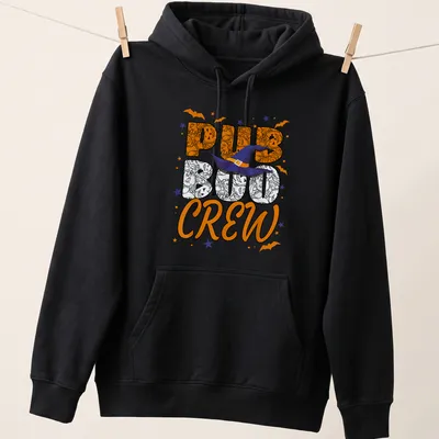Colorful cartoon Halloween design with witch hat and 'PUB BOO CREW' text. — printed on a unisex hoodie