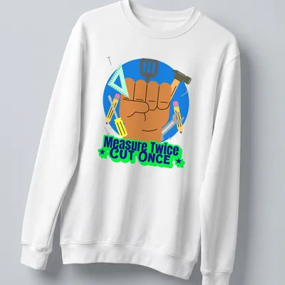 Colorful cartoon design of hand tools with text Measure Twice CUT ONCE — printed on a unisex sweatshirt