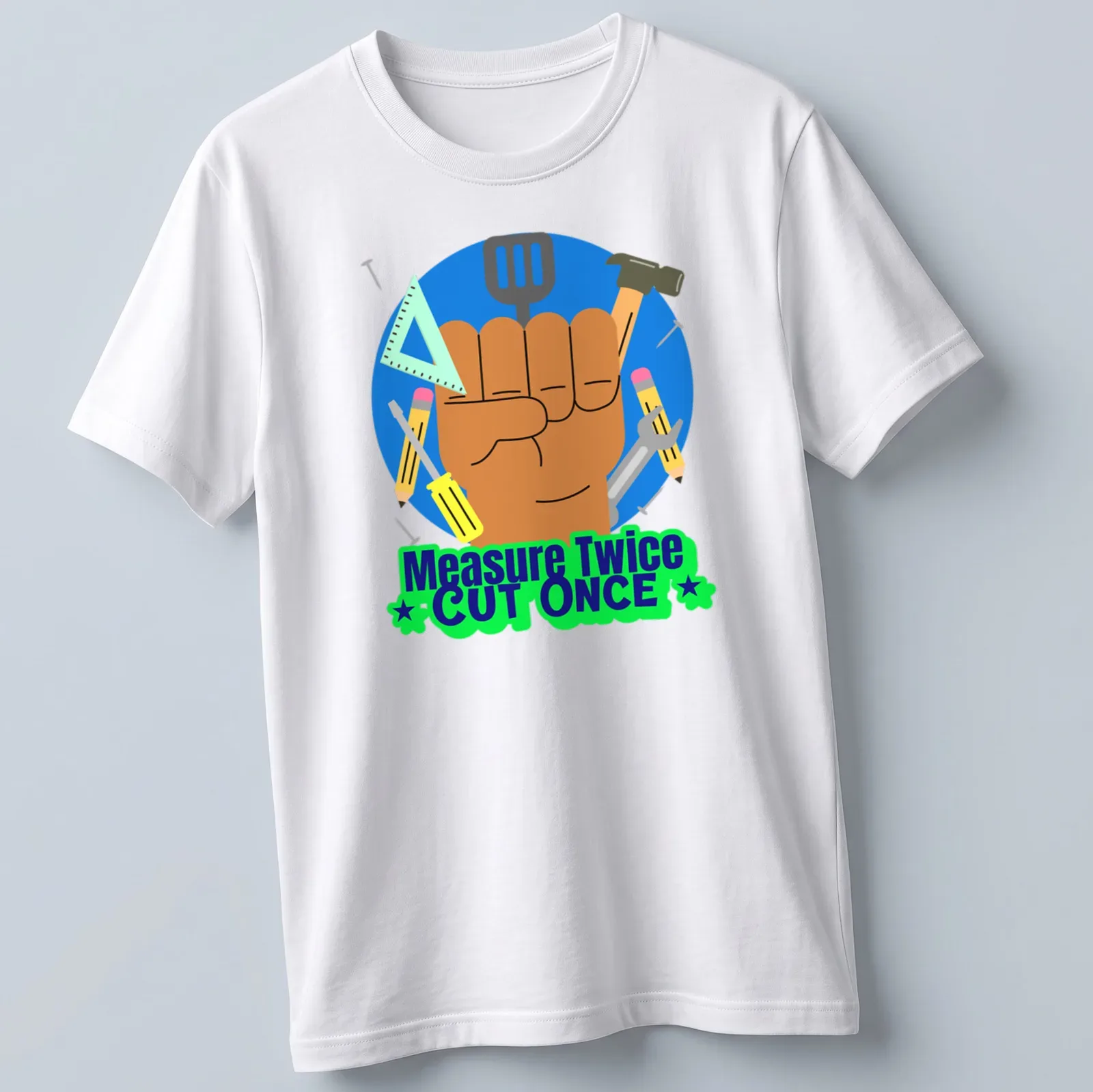 Colorful cartoon design of hand tools with text Measure Twice CUT ONCE — printed on a unisex t-shirt