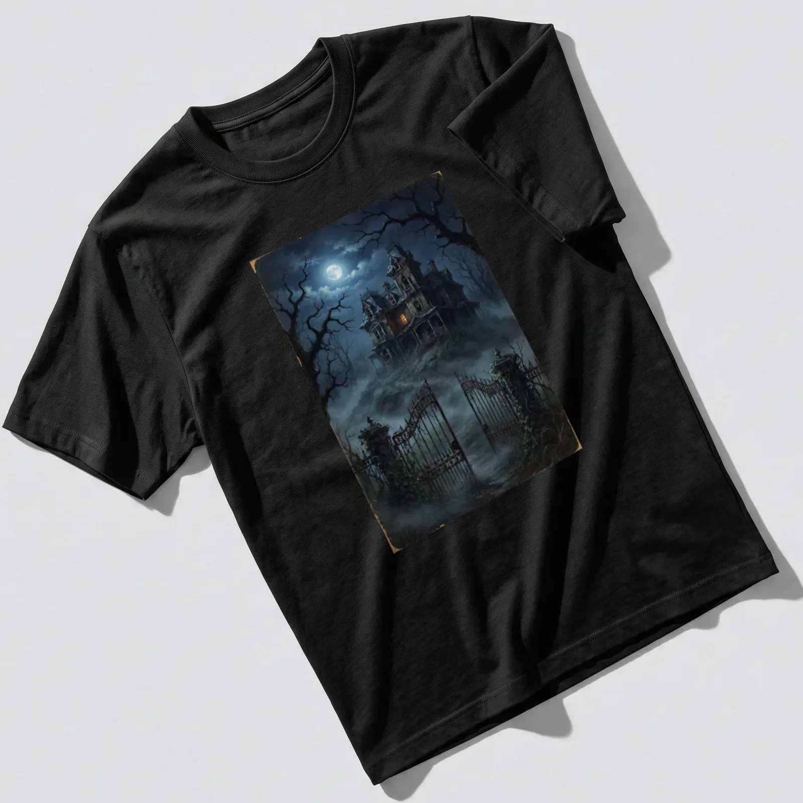 Dark fantasy haunted house illustration with moonlight in blue and orange hues — printed on a unisex t-shirt