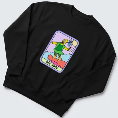 Cartoon design of Homer Simpson with text 'THE FOOL' in colorful print — printed on a unisex sweatshirt
