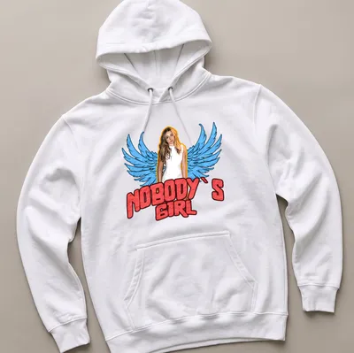 Vintage-style t-shirt featuring a woman with wings and the text 'Nobody's Girl' in bold lettering. — printed on a unisex hoodie
