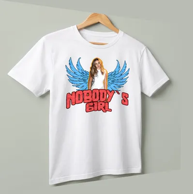 Vintage-style t-shirt featuring a woman with wings and the text 'Nobody's Girl' in bold lettering. — printed on a unisex t-shirt (angled view)