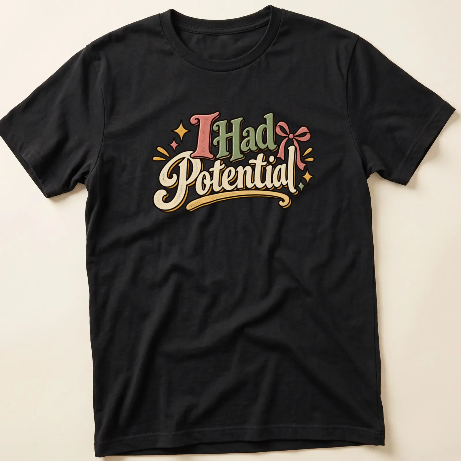 Playful retro t-shirt with the text 'I Had Potential' in green, pink, yellow, and cream. — printed on a unisex t-shirt