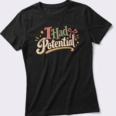 Playful retro t-shirt with the text 'I Had Potential' in green, pink, yellow, and cream. — printed on a women's shirt