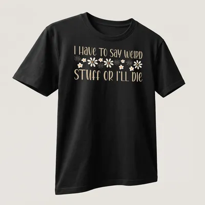 Playful script with daisy motifs and funny introvert humor text — printed on a unisex t-shirt (angled view)