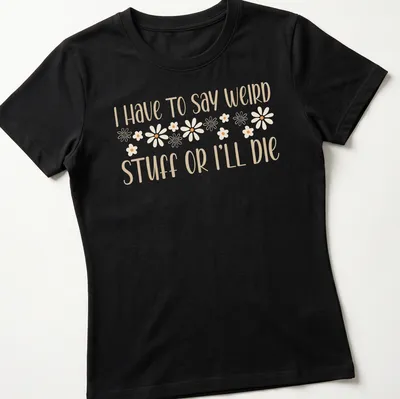 Playful script with daisy motifs and funny introvert humor text — printed on a women's shirt
