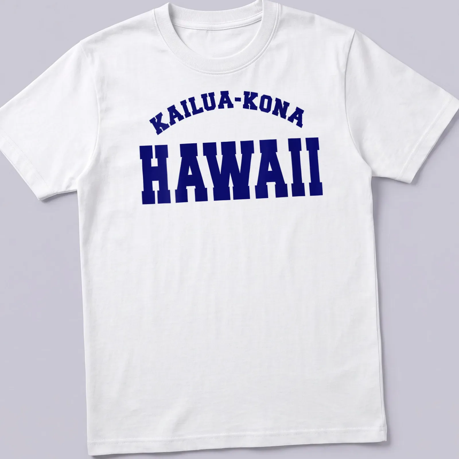 Bold collegiate design featuring Kailua-Kona Hawaii in navy and white. — printed on a unisex t-shirt
