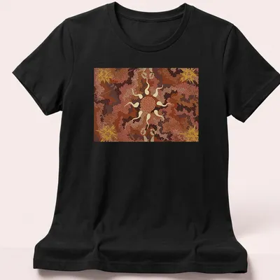 Aboriginal art print featuring a kangaroo and nature elements in earthy tones — printed on a women's shirt