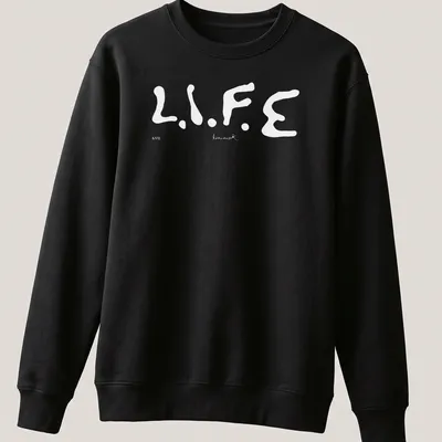 Bold typography t-shirt featuring 'Keinemusik Merch' text — printed on a unisex sweatshirt