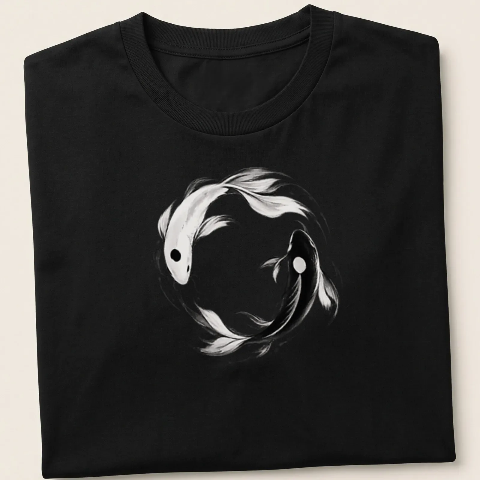 Ink wash illustration of koi fish in yin yang formation in black and white — printed on a unisex t-shirt