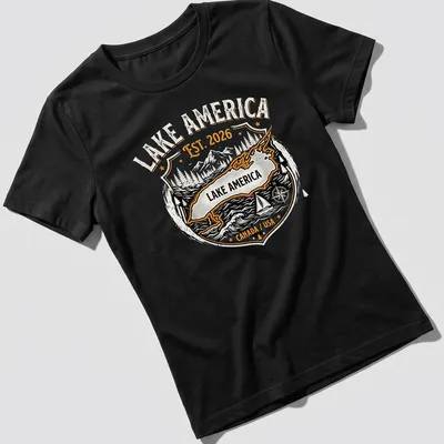 Vintage badge Lake America t-shirt with black, orange, and white text — printed on a women's shirt