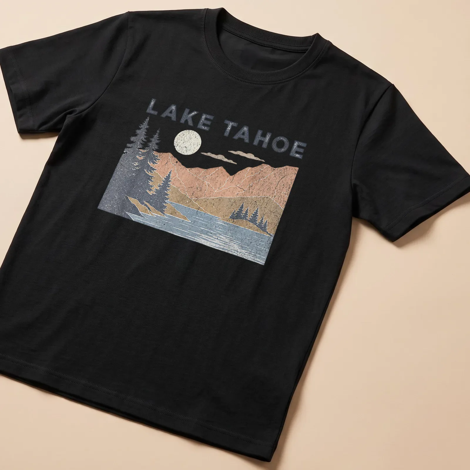 Vintage distressed print of Lake Tahoe mountains and lake scenery with the text 'LAKE TAHOE' — printed on a unisex t-shirt
