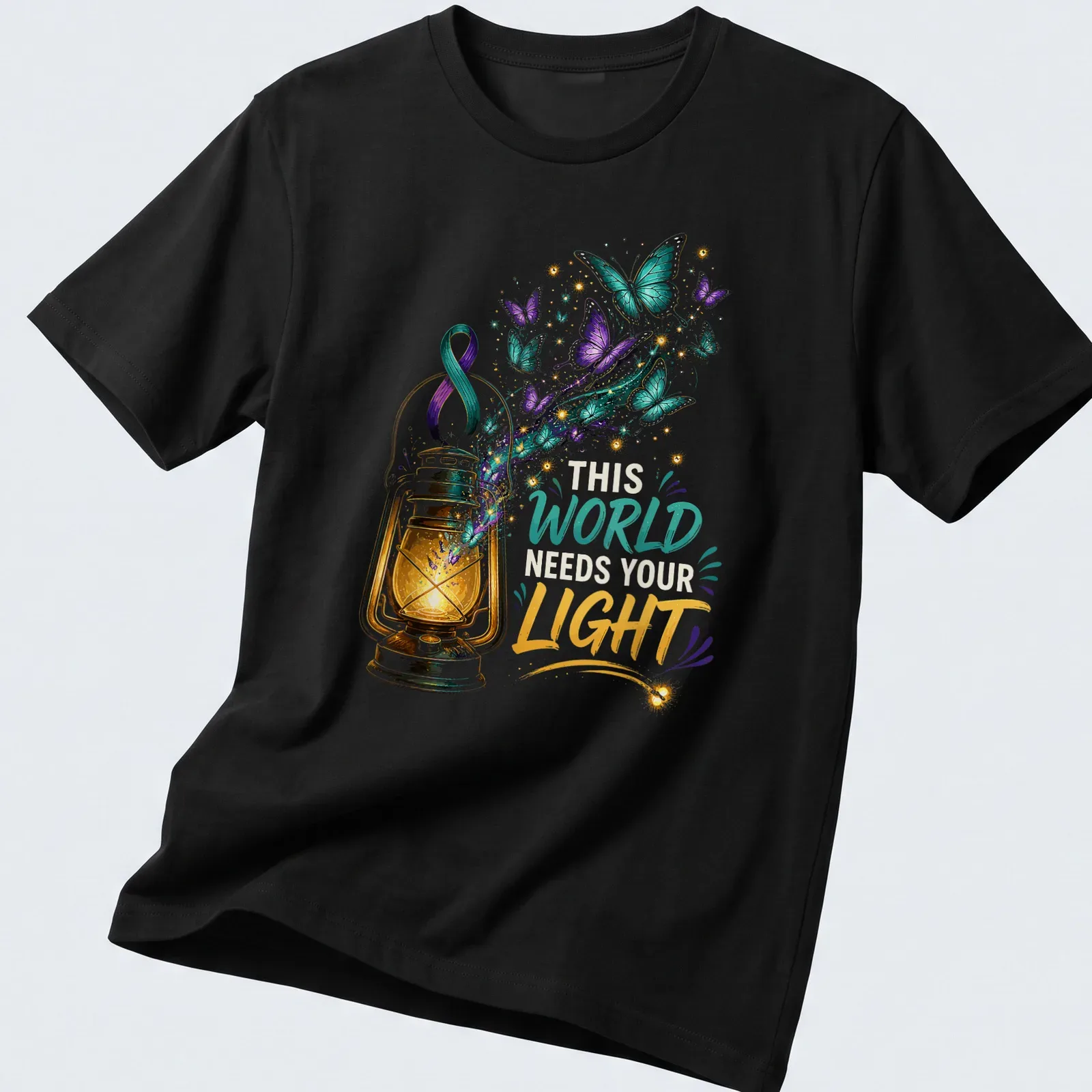 Colorful illustration of a lantern with butterflies and the text 'This World Needs Your Light' — printed on a unisex t-shirt