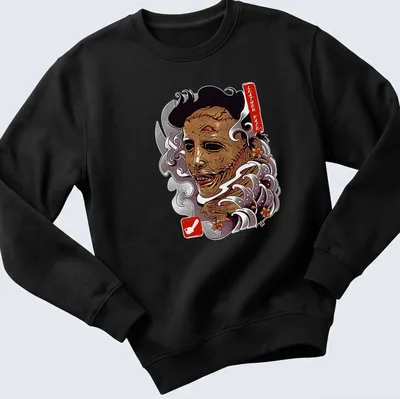 Vintage horror t-shirt featuring Leather Face graphic in brown, white, red, and gray — printed on a unisex sweatshirt