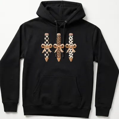 Coquette style t-shirt featuring pencils with bows in leopard and pastel colors — printed on a unisex hoodie