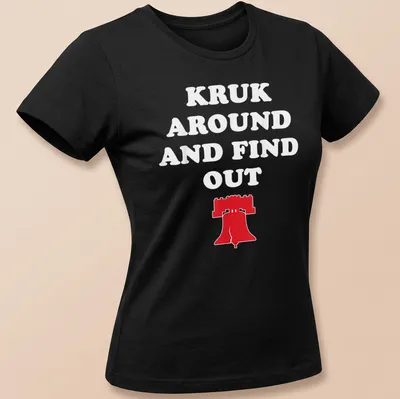 Bold graphic tee featuring the Liberty Bell with text above — printed on a women's shirt