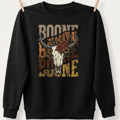 Vintage floral design with longhorn skull and the text Boone Boone Boone — printed on a unisex sweatshirt