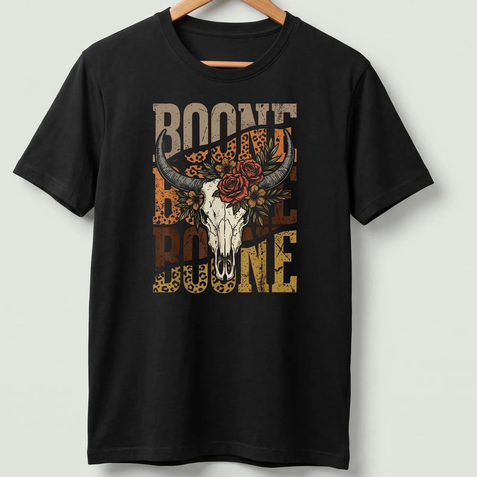 Vintage floral design with longhorn skull and the text Boone Boone Boone — printed on a unisex t-shirt