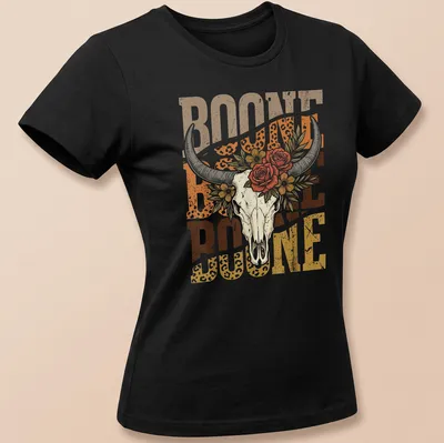 Vintage floral design with longhorn skull and the text Boone Boone Boone — printed on a women's shirt
