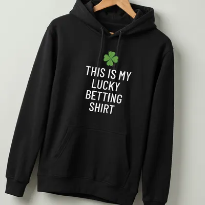 Cartoon style t-shirt with a four-leaf clover and text saying 'This Is My Lucky Betting Shirt' — printed on a unisex hoodie