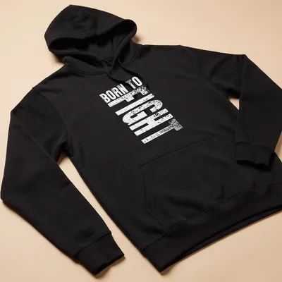 Bold typography design of 'Born To Fight' with martial arts theme in black, red, and white — printed on a unisex hoodie