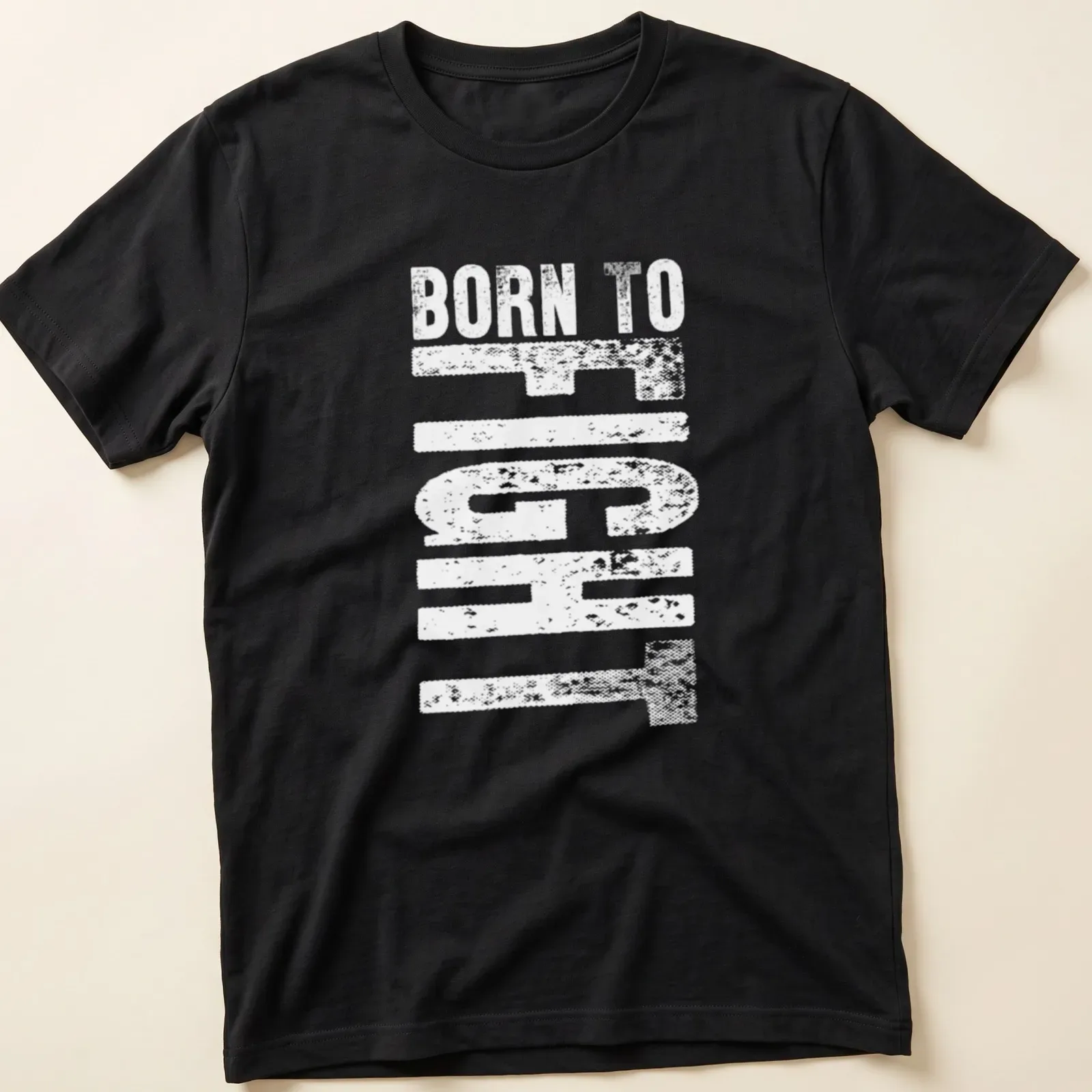 Bold typography design of 'Born To Fight' with martial arts theme in black, red, and white — printed on a unisex t-shirt