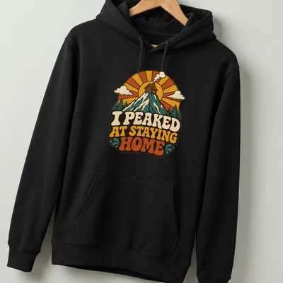 Retro mountain cabin design with text about staying home — printed on a unisex hoodie