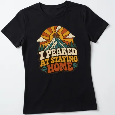 Retro mountain cabin design with text about staying home — printed on a women's shirt