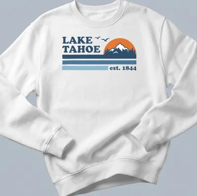 Retro graphic featuring Lake Tahoe est. 1844 in blue and orange — printed on a unisex sweatshirt