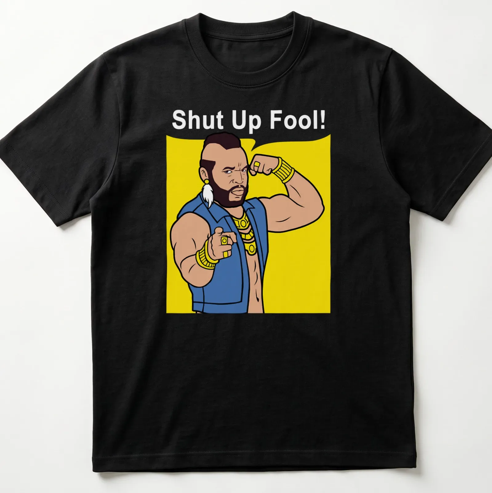 Cartoon Mr. T with the phrase 'Shut Up Fool!' in bright colors — printed on a unisex t-shirt